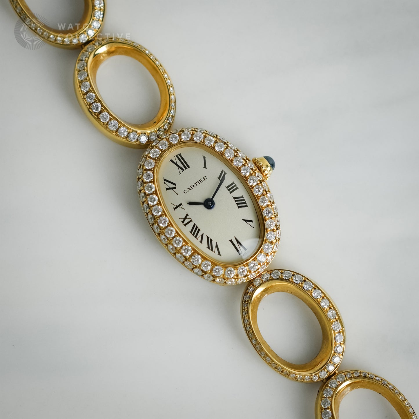 Cartier Baignoire 18K yellow gold oval bracelet with custom set diamonds 1967