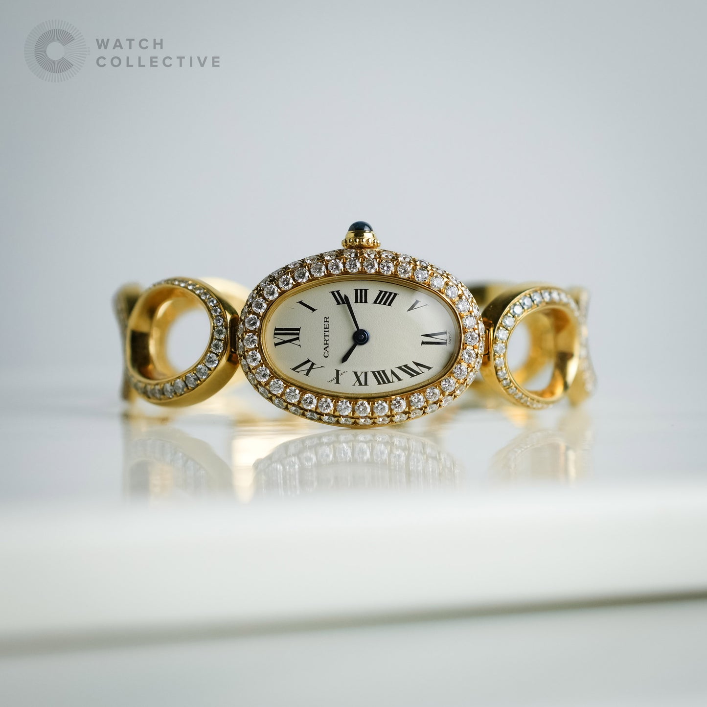 Cartier Baignoire 18K yellow gold oval bracelet with custom set diamonds 1967
