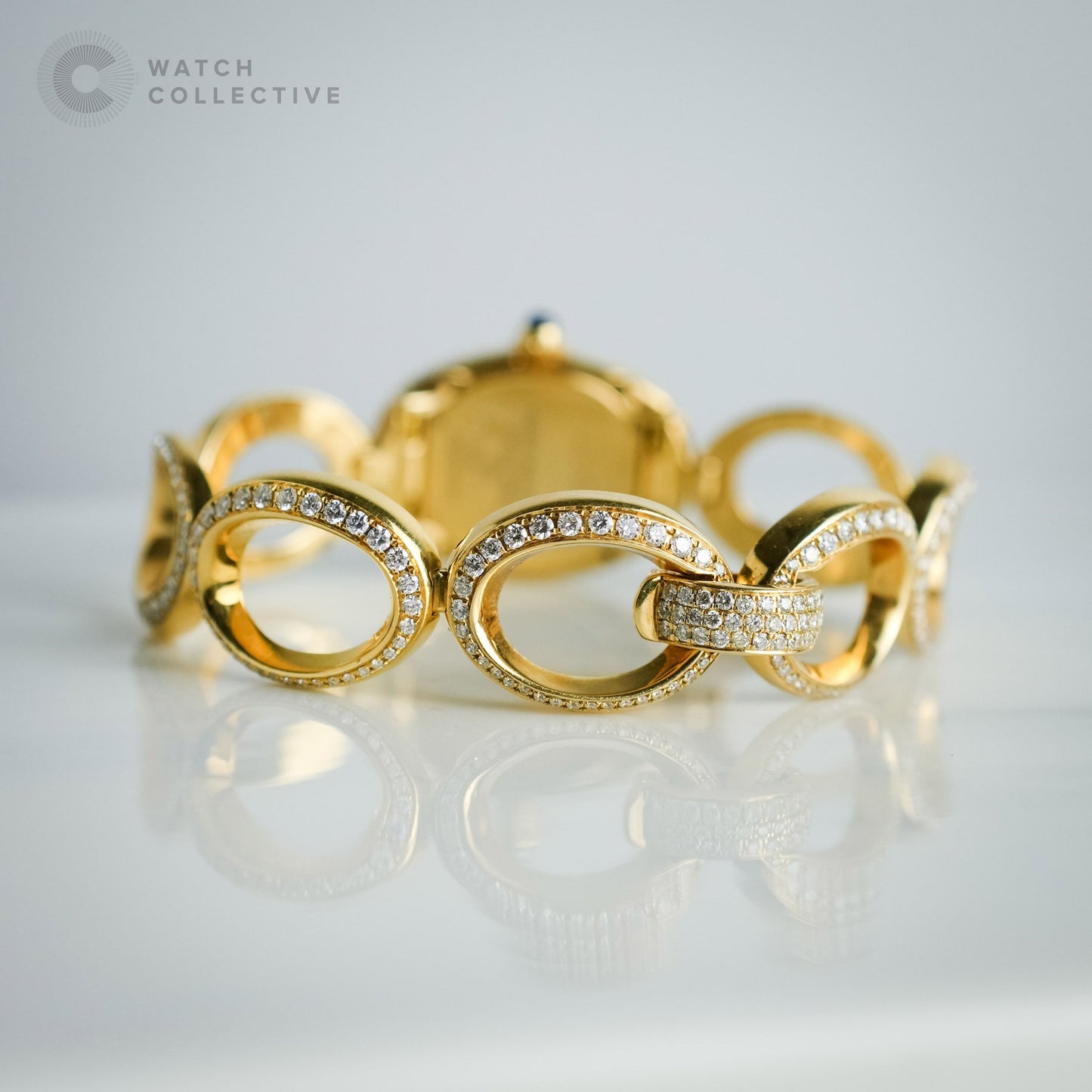 Cartier Baignoire 18K yellow gold oval bracelet with custom set diamonds 1967