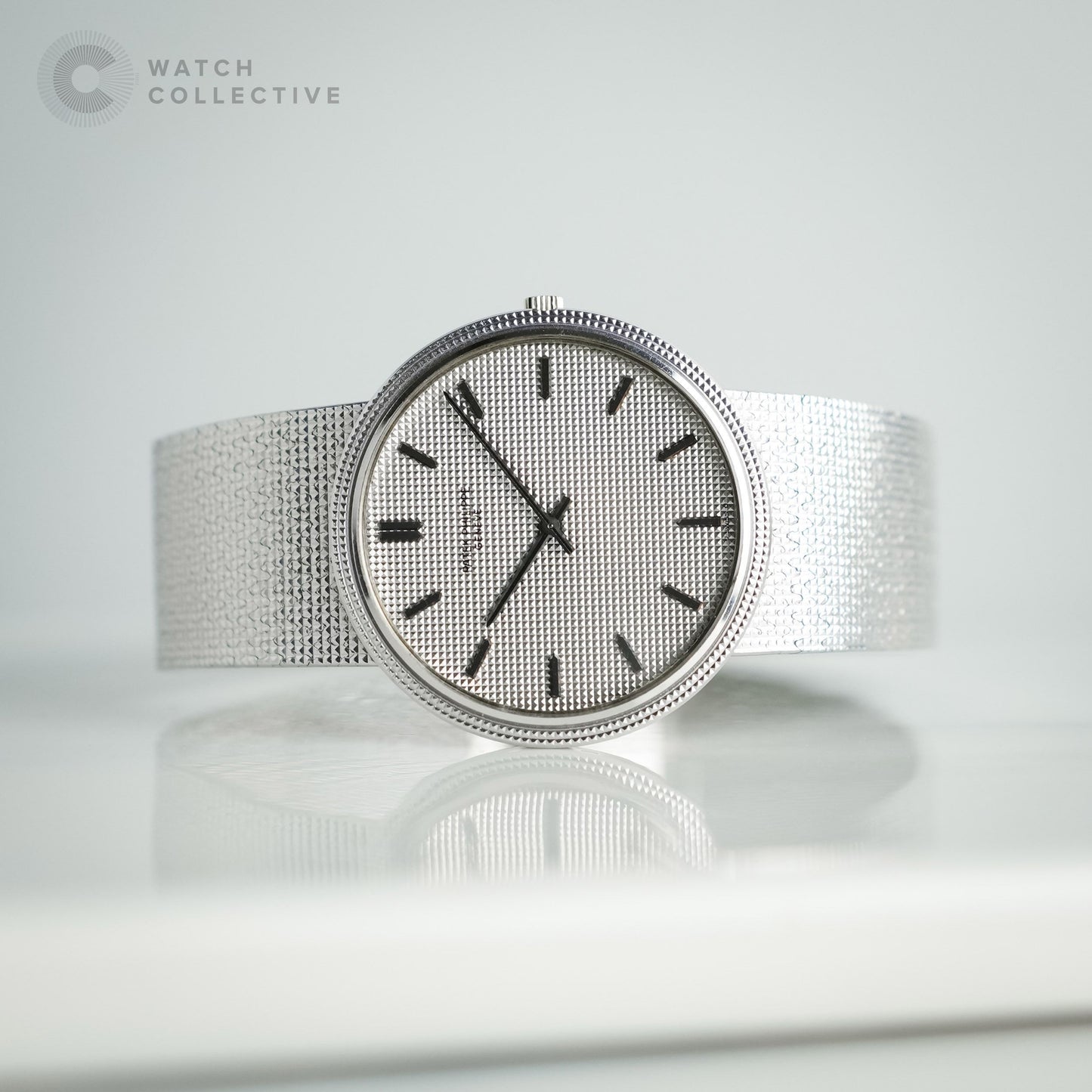 Patek Philippe Vintage White gold integrated bracelet watch with hobnail bezel and dial