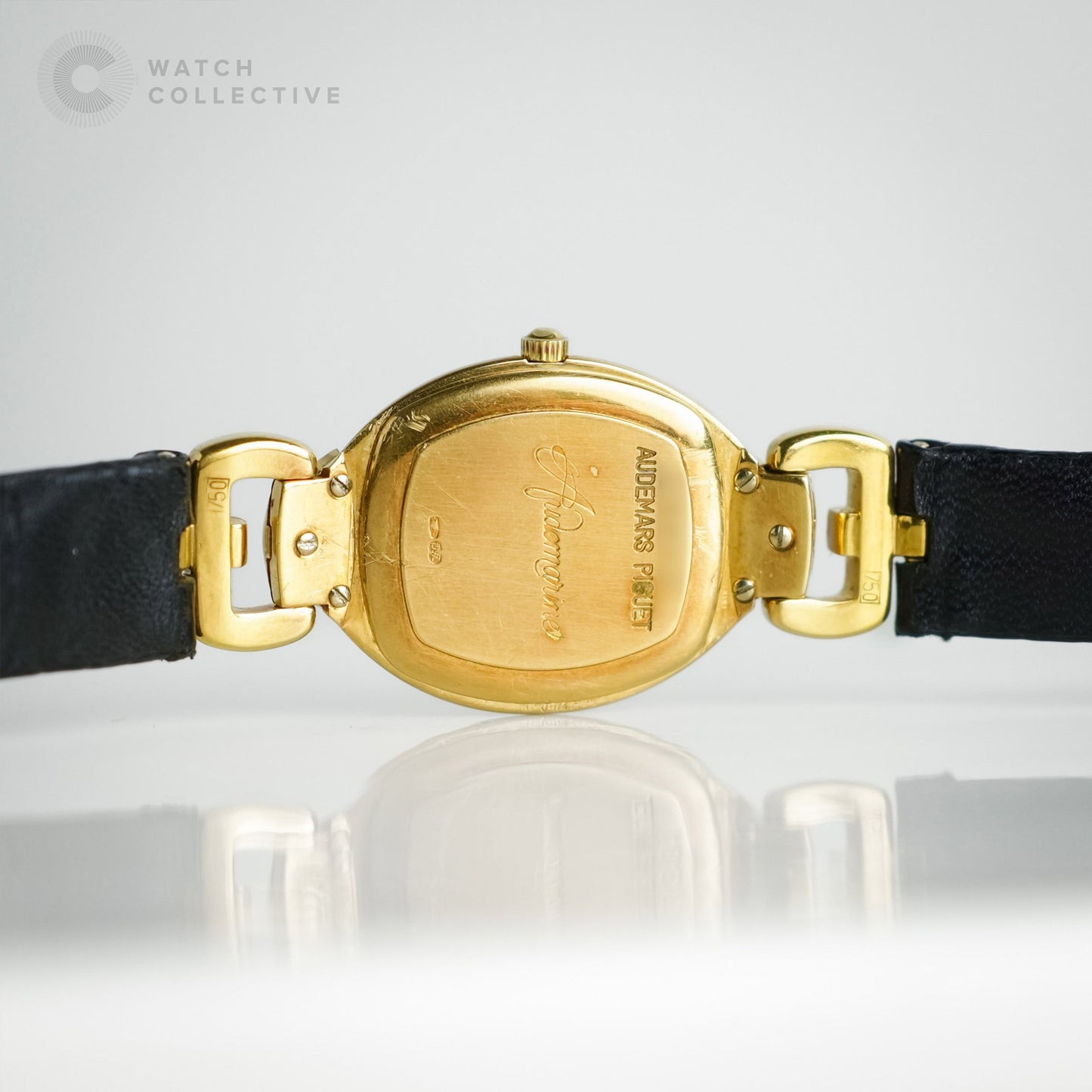 Audemars Piguet Audemarine 18k Yellow Gold White dial, black Arabic numerals and hands quartz tonneau 66559BA