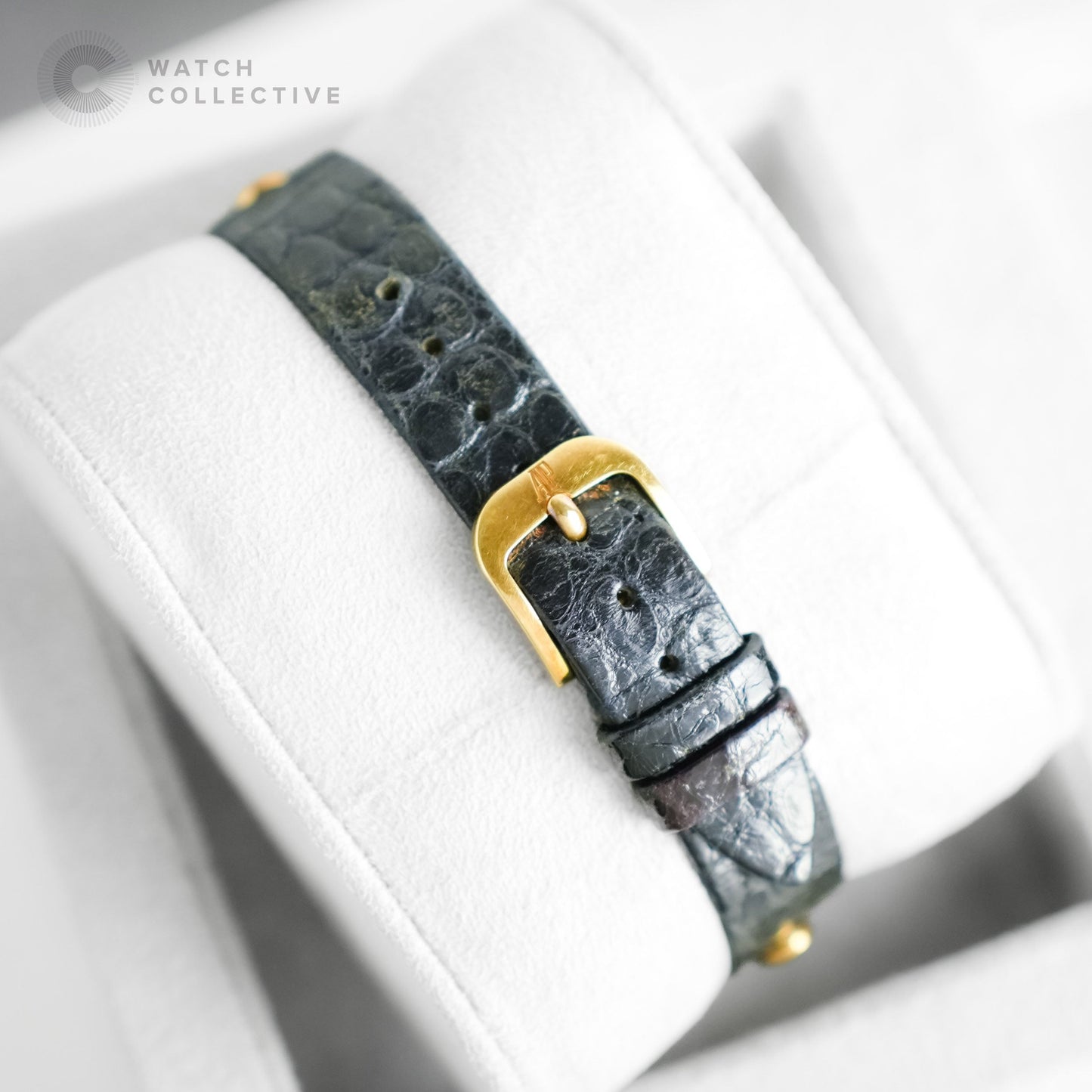 Audemars Piguet Audemarine 18k Yellow Gold White dial, black Arabic numerals and hands quartz tonneau 66559BA