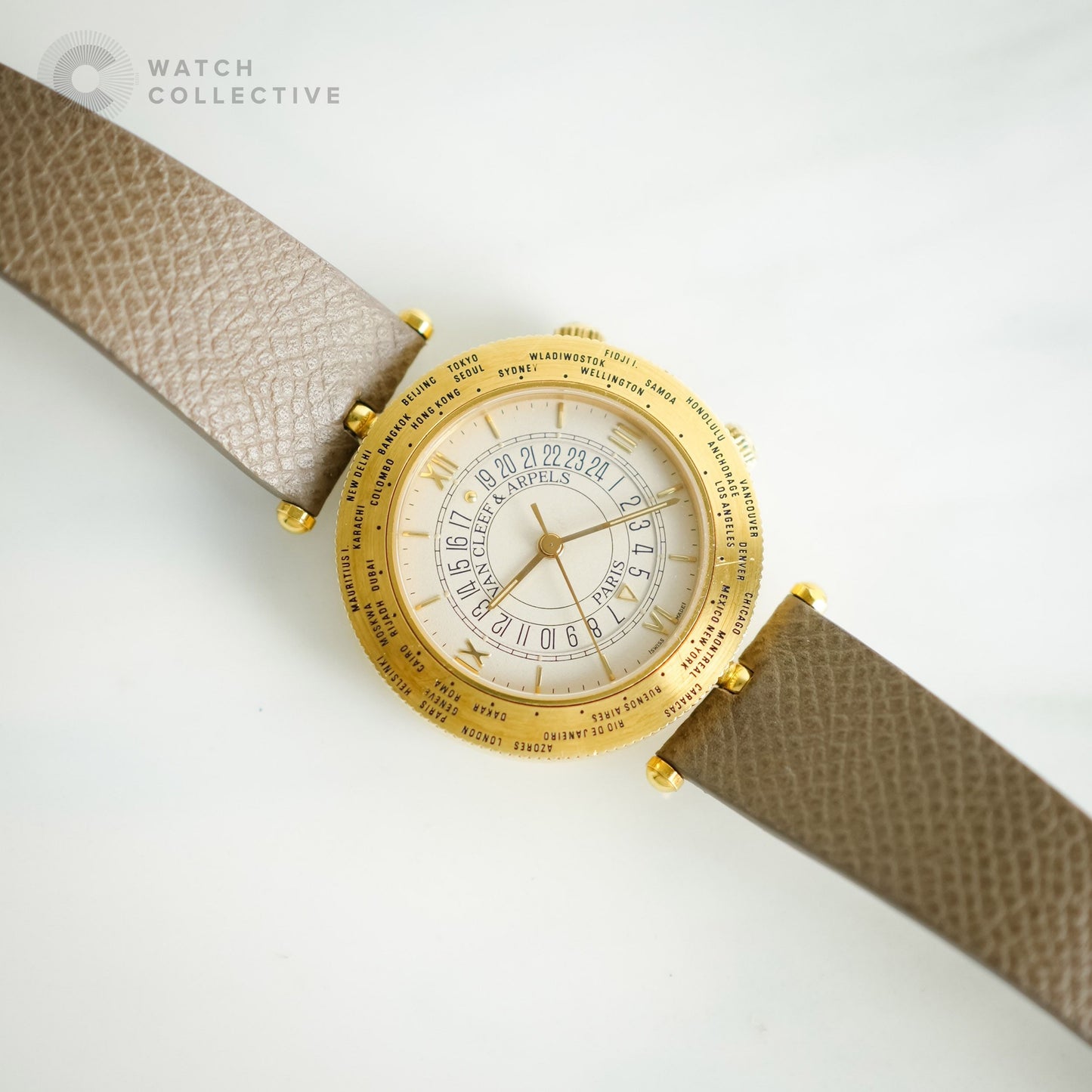 Van Cleef & Arpels World Timer Traveler 18k yellow gold buckle and head 36mm automatic