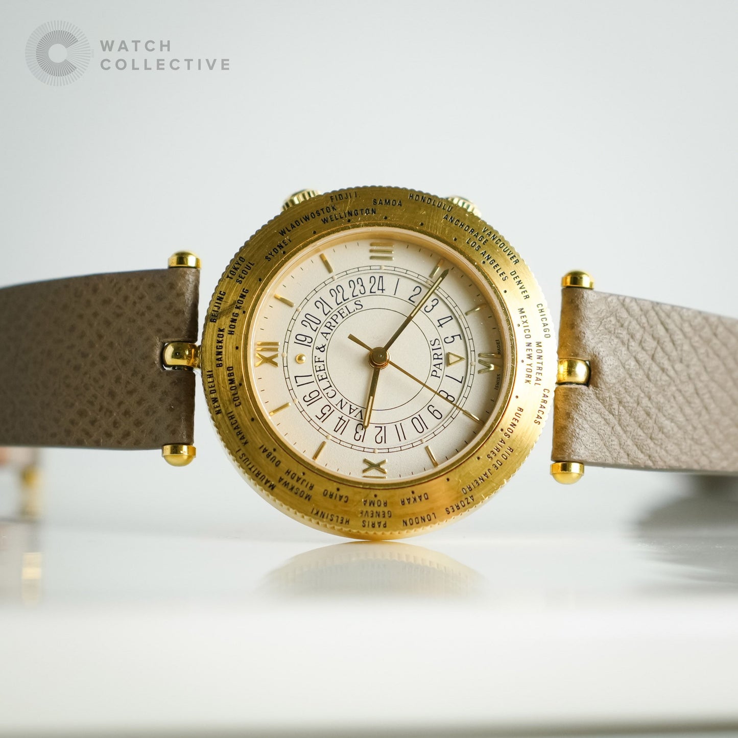 Van Cleef & Arpels World Timer Traveler 18k yellow gold buckle and head 36mm automatic