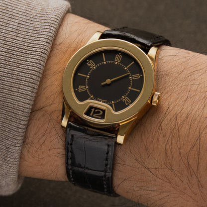 Bulgari Gianni Enigma 18K Yellow Gold 32mm Quartz (Jump Hour) R114162G