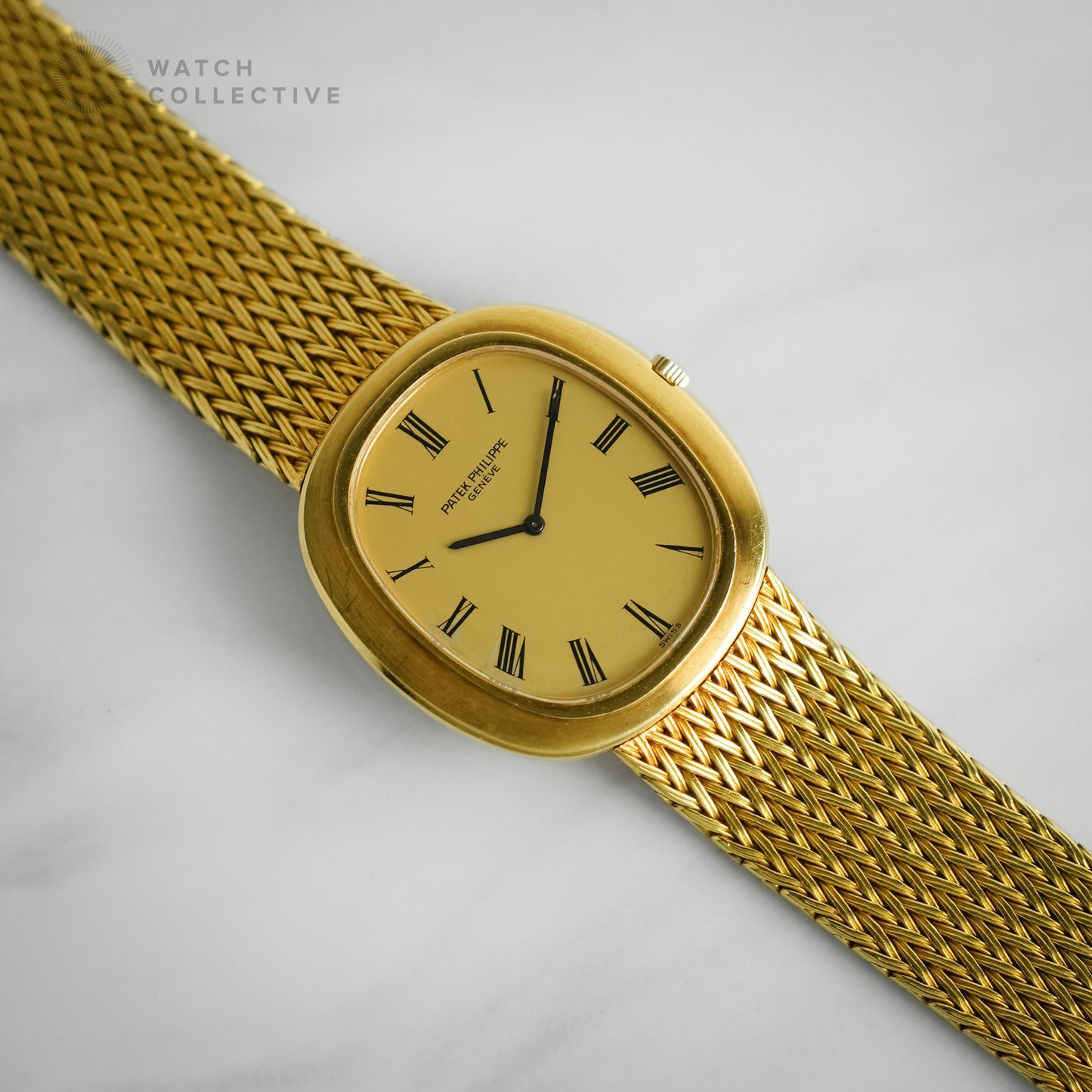 Patek Philippe 18k yellow gold dress watch 33mm automatic 3589