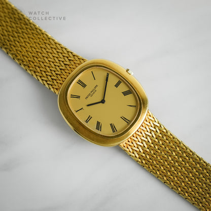 Patek Philippe 18k yellow gold dress watch 33mm automatic 3589