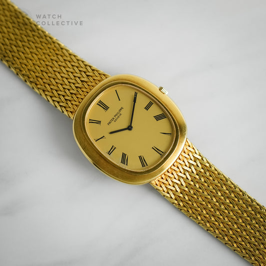 Patek Philippe 18k yellow gold dress watch 33mm automatic 3589