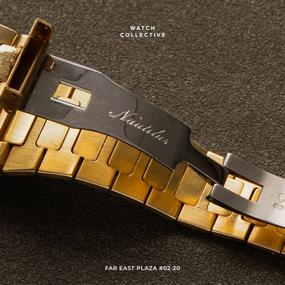 Patek Philippe Nautilus 18k Yellow Gold Pave Diamond dial Ruby Marker 37mm automatic 3800