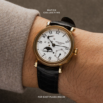 Patek Philippe Travel Time 18k yellow gold 35mm Automatic