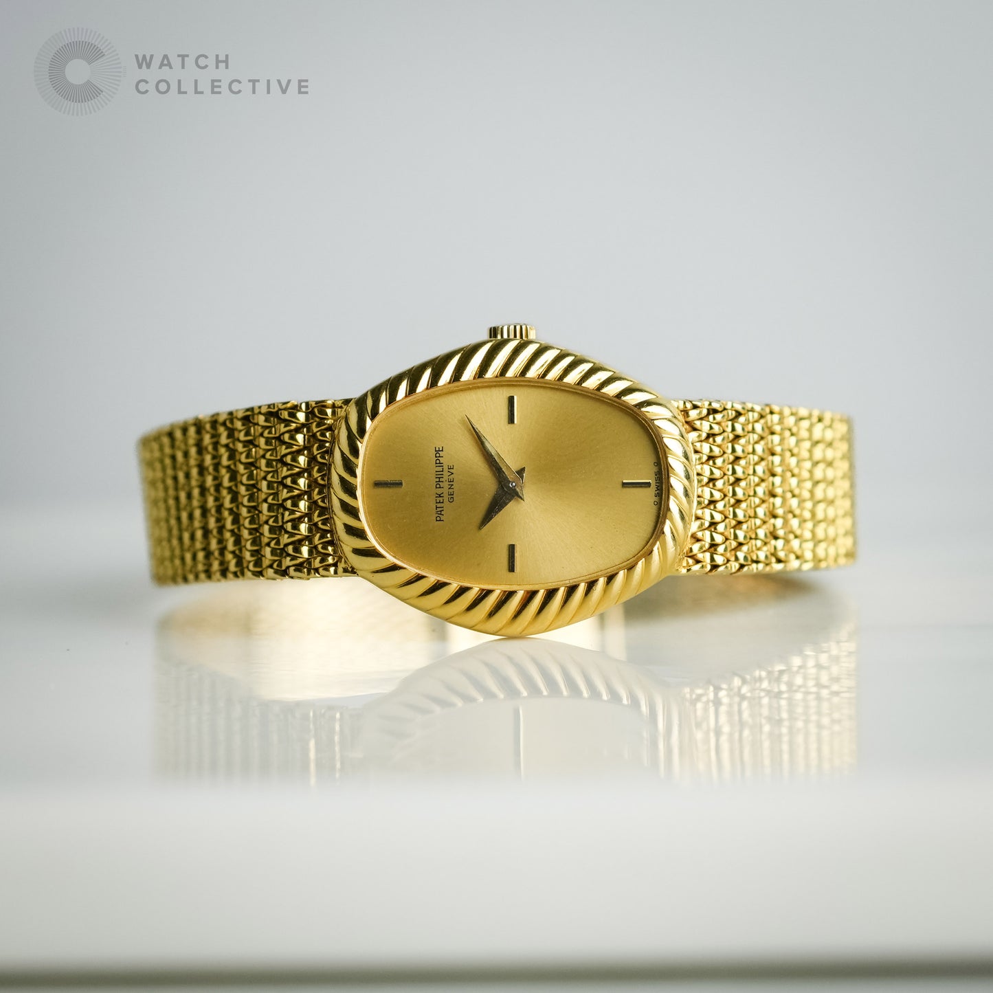 Patek Philippe 18k yellow gold mesh bracelet 21x26mm manual 4462