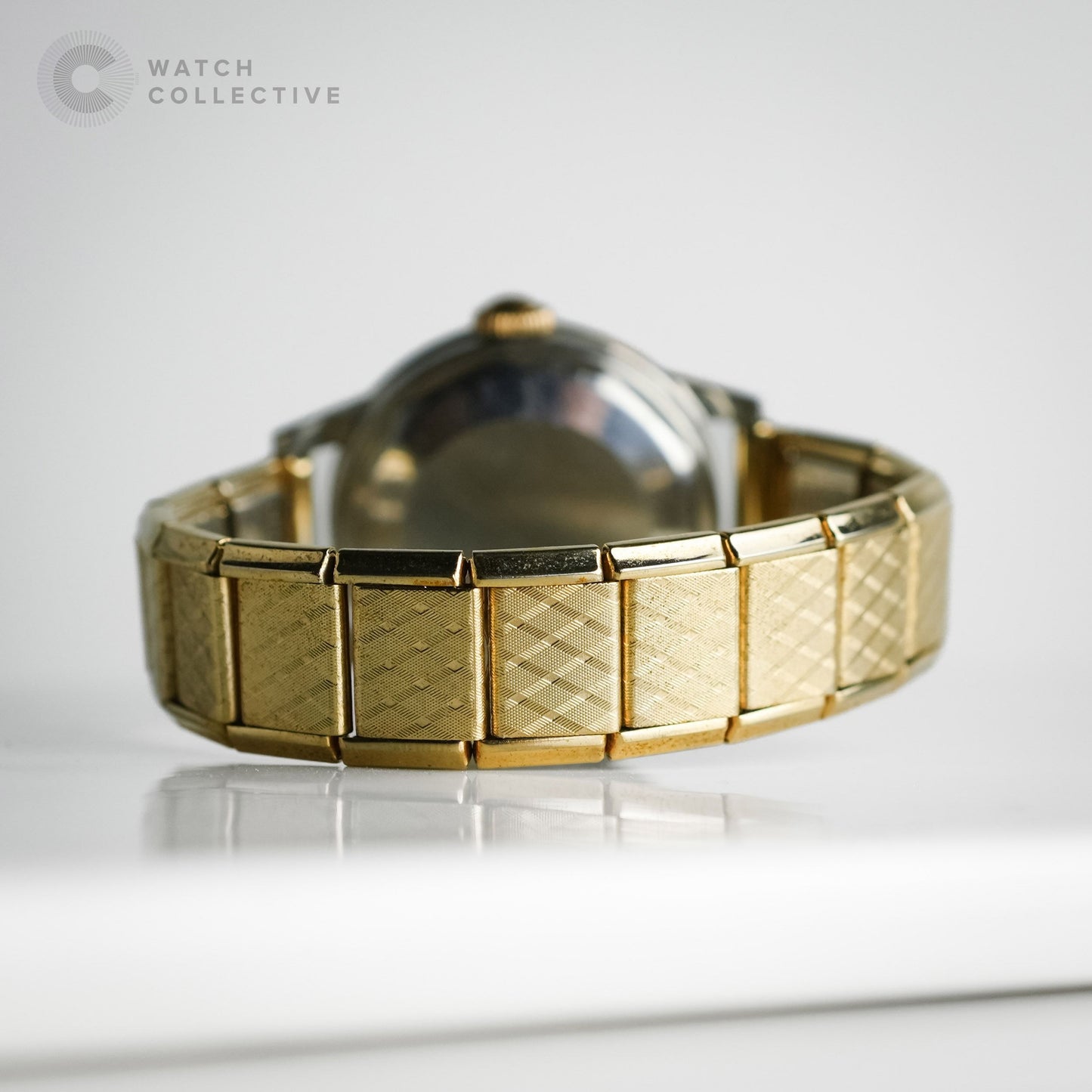 Movado De-Luxe 50s Vintage Gold Toned Bumper with Brick-style bracelet 30mm Automatic