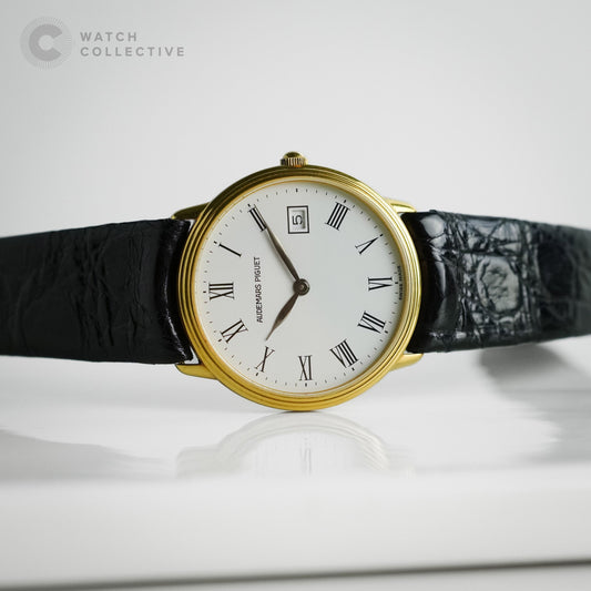 Audemars Piguet Yellow gold white dial 31mm with original tang buckle and strap quartz
