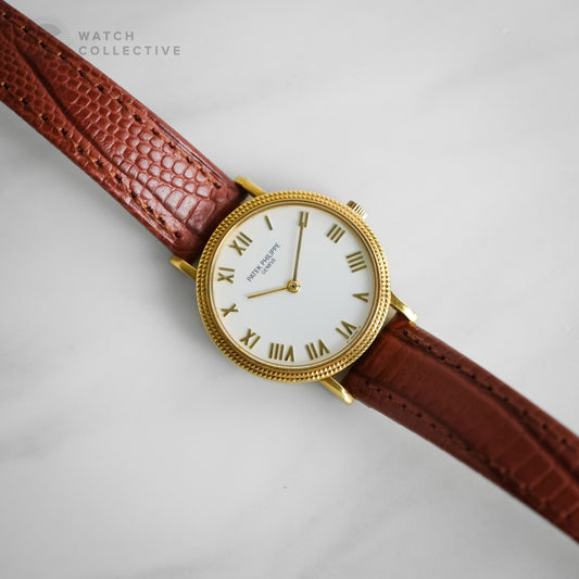Patek Philippe Calatrava 18k Yellow Gold White Dial Roman Clous De Paris Hobnail 25mm Quartz 4819