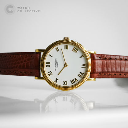 Patek Philippe Calatrava 18k Yellow Gold White Dial Roman Clous De Paris Hobnail 25mm Quartz 4819
