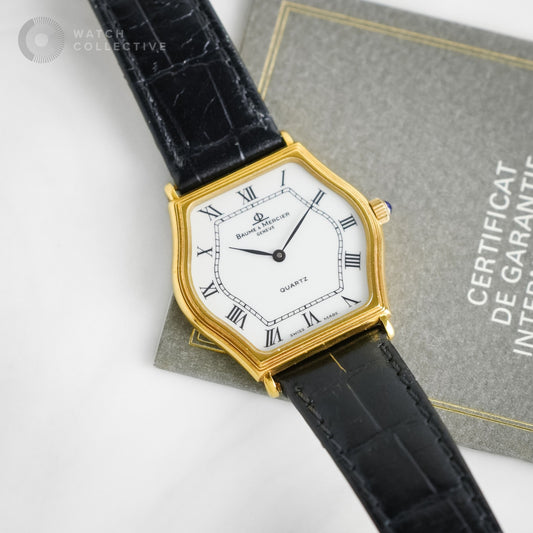 Baume et Mercier Vintage Tortue 18K Yellow Gold White Dial Roman Index Black Leather Strap 30mm Quartz