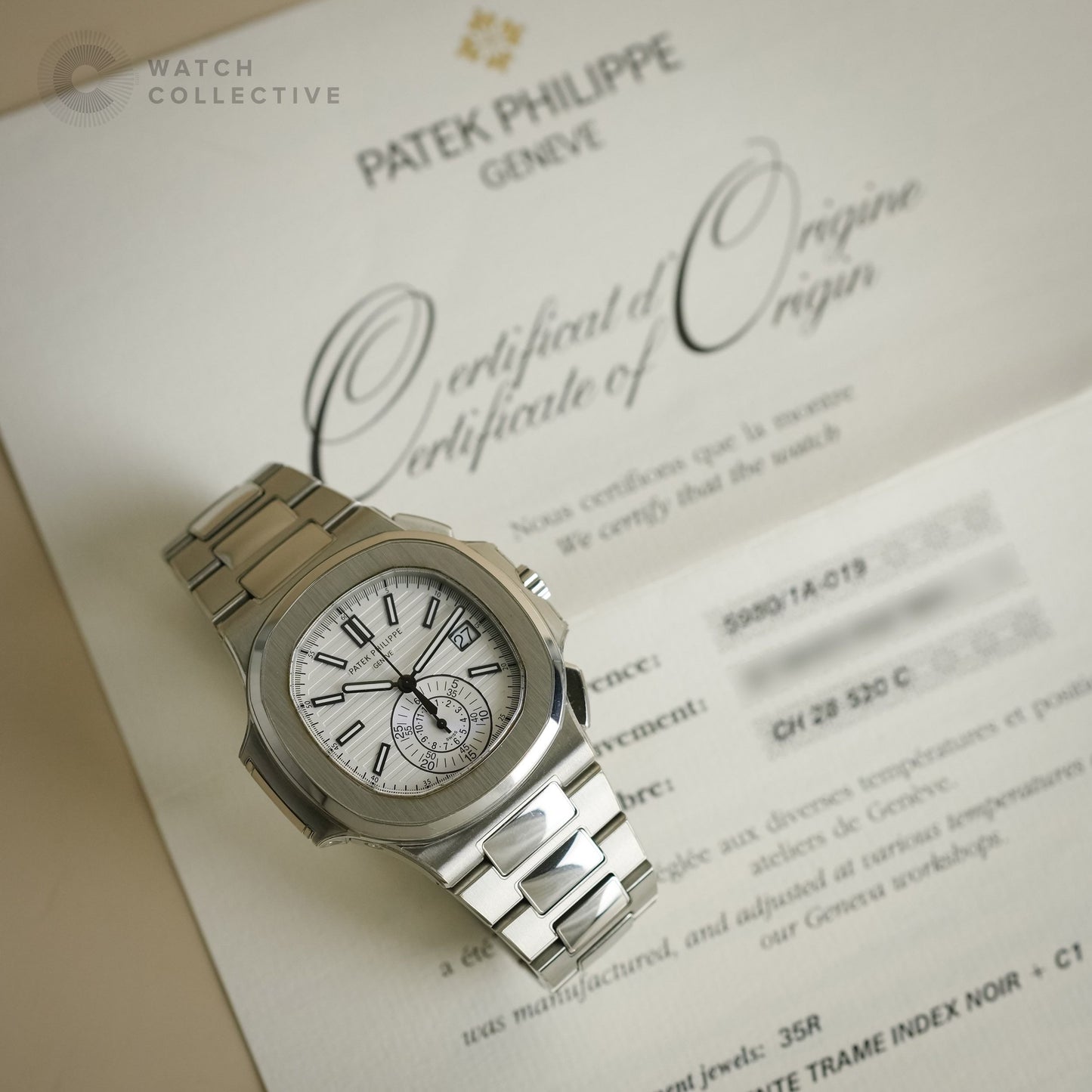 Patek Philippe Nautilus Chronograph Stainless Steel White Dial 5980/1A-019