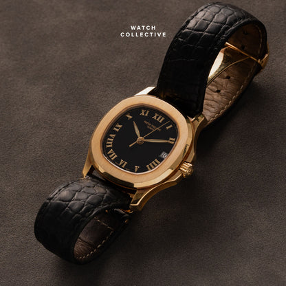Patek Philippe Aquanaut 18k Yellow Gold black dial 35mm automatic 5060J