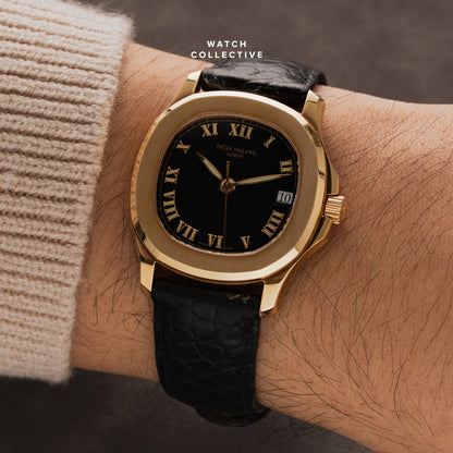 Patek Philippe Aquanaut 18k Yellow Gold black dial 35mm automatic 5060J